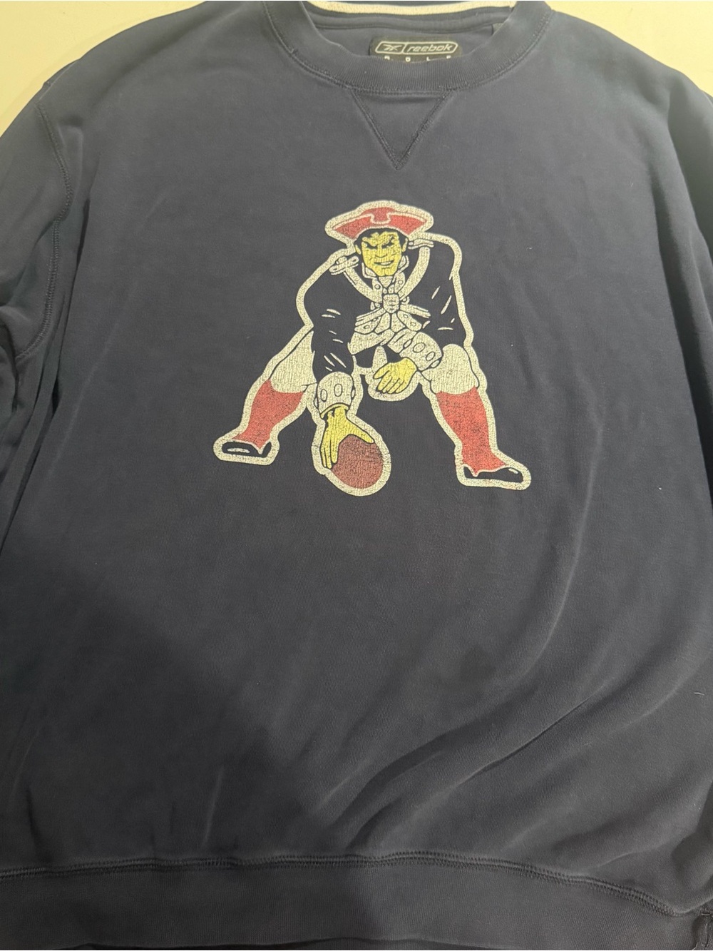 Reebok Men’s Navy Crewneck Sweatshirt with Red & Yellow Mascot Graphic